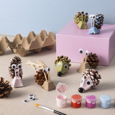 Hedgehogs and snails made from egg cartons and pine cones