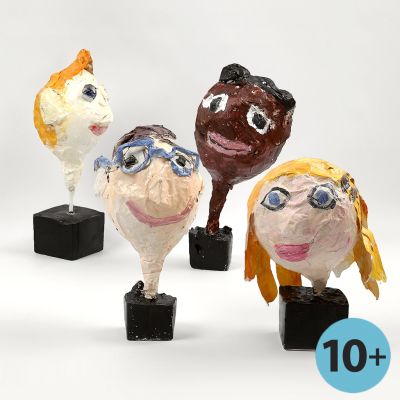A Head with facial Features made from Papier-M&acirc;ch&eacute; on a Balloon